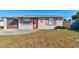 Charming single-story home featuring a well-maintained lawn and inviting front entrance at 26 Ocean Shore Dr, Ormond Beach, FL 32176