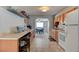 Functional kitchen with ample counter space, wooden cabinets, and modern appliances at 26 Ocean Shore Dr, Ormond Beach, FL 32176