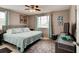 Serene main bedroom featuring stylish decor, a comfortable bed, and plenty of natural light at 26 Ocean Shore Dr, Ormond Beach, FL 32176