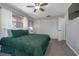Bright bedroom featuring plush carpet and ample storage with a closet, accentuated by natural light at 2842 English Dr, Deltona, FL 32738