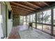 Cozy sun room featuring lots of light, wood ceiling, and stylish decor create a relaxing atmosphere at 2842 English Dr, Deltona, FL 32738