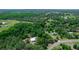 Expansive aerial view of the lush, green landscape surrounding the home on a sprawling property at 2953 Sled Rd, Christmas, FL 32709