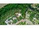 An aerial view shows a spacious parcel with the property bordered in red at 2953 Sled Rd, Christmas, FL 32709