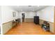 Open basement space with hardwood flooring, ample room for storage and entertainment at 2953 Sled Rd, Christmas, FL 32709