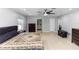 Spacious main bedroom with tile flooring and closet, leading into an ensuite bathroom for added convenience at 2953 Sled Rd, Christmas, FL 32709