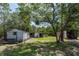 Outbuildings on the property feature additional storage and workspace at 2953 Sled Rd, Christmas, FL 32709