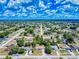 Aerial view of a quiet, tree-lined neighborhood at 2978 Greynolds St, Deltona, FL 32738