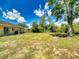 Expansive backyard offers plenty of room for outdoor activities and relaxation under the sky at 2978 Greynolds St, Deltona, FL 32738