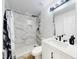Stylish bathroom with marble tile and modern fixtures at 2978 Greynolds St, Deltona, FL 32738