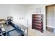Bedroom featuring a dark wood dresser, desk and natural light at 2978 Greynolds St, Deltona, FL 32738