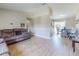 Comfortable living room features modern flooring and a large sofa for relaxation at 2978 Greynolds St, Deltona, FL 32738