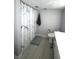 Bathroom with marble shower curtain at 3003 S Atlantic Ave # 17A1, Daytona Beach Shores, FL 32118