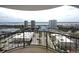 Expansive city view from a high-rise balcony, showcasing nearby buildings and cityscape at 3003 S Atlantic Ave # 17A1, Daytona Beach Shores, FL 32118