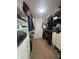 Organized walk-in closet with ample storage at 3003 S Atlantic Ave # 17A1, Daytona Beach Shores, FL 32118