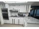 Bright kitchen featuring stainless steel appliances and sleek countertops at 3003 S Atlantic Ave # 17A1, Daytona Beach Shores, FL 32118