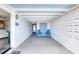 Carport area featuring a seating area and unique breezeway block wall at 31 River Shore Dr, Ormond Beach, FL 32176