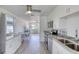 Bright, open kitchen offering modern appliances and a seamless flow into the dining and living areas at 31 River Shore Dr, Ormond Beach, FL 32176
