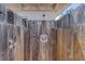Rustic outdoor shower area enclosed by a wooden fence for privacy and convenience at 31 River Shore Dr, Ormond Beach, FL 32176