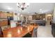 Open concept dining room with a view into the kitchen and living room, great for entertaining and Gathering gatherings at 319 Bellingrath Ter, Deland, FL 32724