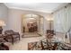 Inviting living room showcasing neutral walls that lead to an adjacent dining area at 319 Bellingrath Ter, Deland, FL 32724