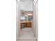 The bathroom features a long vanity with double sinks, a separate shower, and an abundance of cabinet storage space at 319 Bellingrath Ter, Deland, FL 32724