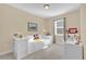 Bright bedroom features a built-in bed with storage and a dedicated study area at 320 W Victoria Trails Blvd, Deland, FL 32724