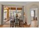 Cozy dining area with sliding glass doors leading to an outdoor patio at 320 W Victoria Trails Blvd, Deland, FL 32724