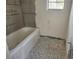 Bathroom being renovated with new backer board and a bathtub at 327 Frances Ter, Daytona Beach, FL 32118