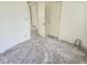 Spacious bedroom with neutral walls and two doors awaiting your personal touch at 327 Frances Ter, Daytona Beach, FL 32118