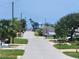 Charming street view leading to the beach, showcasing the idyllic coastal community at 327 Frances Ter, Daytona Beach, FL 32118