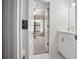 Bathroom view into bedroom featuring a white vanity with bronze hardware at 3357 Black Willow Trl, Deland, FL 32724