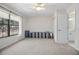 Bright bedroom featuring a large window, closet, and carpeted floors at 3357 Black Willow Trl, Deland, FL 32724