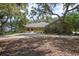 Beautiful brick home with mature trees and a spacious front yard at 3357 Black Willow Trl, Deland, FL 32724