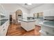 Bright, spacious kitchen with white cabinetry and a center island at 3357 Black Willow Trl, Deland, FL 32724