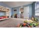 Bedroom with bunkbeds, toys, and a doorway to the hallway at 348 Southern Winds Blvd, Deland, FL 32720