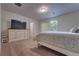 Bright and spacious bedroom with large window, plush carpeting, and plenty of natural light at 348 Southern Winds Blvd, Deland, FL 32720