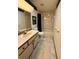 Bathroom with a vanity, toilet, and shower/tub combination, offering convenience and functionality at 37 Meadowwood Trl, Deland, FL 32724