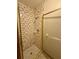 Tiled shower stall with shower head and control in this well maintained bathroom at 37 Meadowwood Trl, Deland, FL 32724
