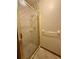 Well-lit bathroom with a glass-enclosed shower and towel rack, providing a clean and functional space at 37 Meadowwood Trl, Deland, FL 32724