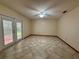 Room with tile flooring and a ceiling fan offers a serene ambiance, enhanced by natural light at 37 Meadowwood Trl, Deland, FL 32724