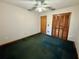 Comfortable bedroom with ceiling fan, closet, and neutral walls at 37 Meadowwood Trl, Deland, FL 32724