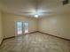 Bedroom featuring outdoor access, ceiling fan, and neutral flooring providing a calm and inviting retreat at 37 Meadowwood Trl, Deland, FL 32724