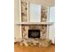 Stone fireplace with a decorative mantel and hearth at 37 Meadowwood Trl, Deland, FL 32724