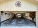 Spacious garage with laundry area, storage, and access to the home's interior at 37 Meadowwood Trl, Deland, FL 32724