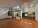 Bright and airy living room with hardwood floors and vaulted ceiling at 37 Meadowwood Trl, Deland, FL 32724