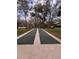 Community shuffleboard courts in a peaceful outdoor setting, perfect for recreation at 37 Meadowwood Trl, Deland, FL 32724