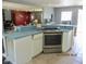 Well-equipped kitchen featuring stainless steel appliances and ample counter space at 3788 Fir Ct, Ormond Beach, FL 32174