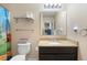 Bathroom features granite counters, vanity, toilet, and shower with curtain at 4297 Regal Town Ln, Lake Mary, FL 32746