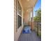 Inviting front porch with chairs and a view of the neighborhood at 4297 Regal Town Ln, Lake Mary, FL 32746