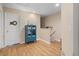 Upstairs hallway with stylish furniture and decor; hardwood floors and natural light at 4297 Regal Town Ln, Lake Mary, FL 32746